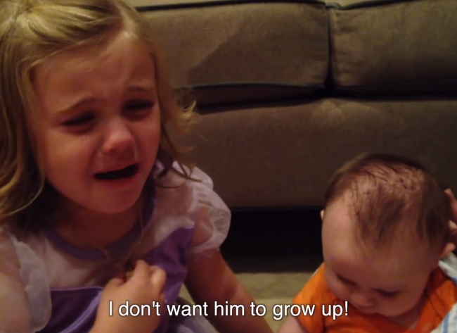 Little Girl Is Devastated That Baby Brother Must Grow Up. The Baby's Reaction At 0:31 Is Priceless!