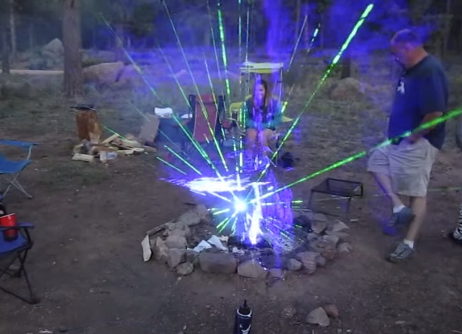 This Is What Happens When You Shine Wicked Lasers Into A Campfire