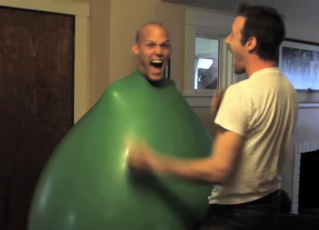 Guy Climbs In A Giant Balloon, And It's Hysterically Funny