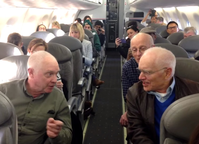Passengers On Plane Take Their Phones Out The Second These Elderly Men Do This