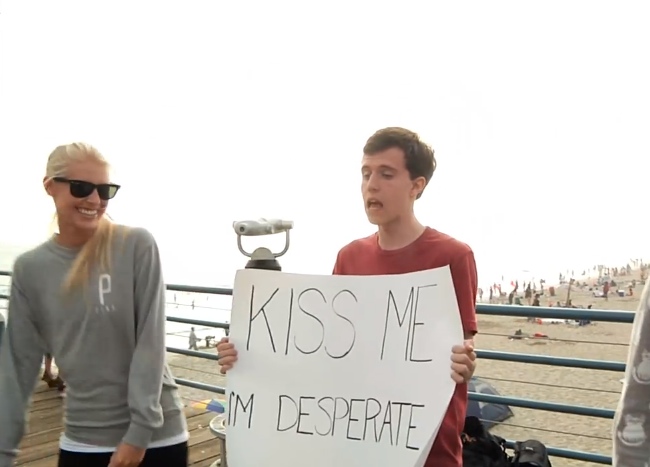 Would a 'Kiss Me I'm Desperate' sign work? Let's find out!