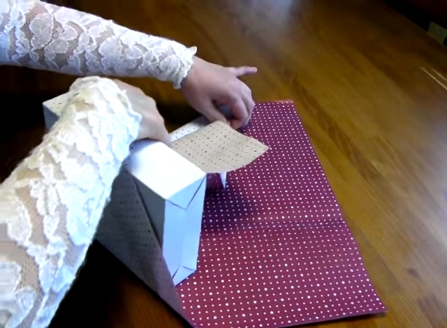 A Neat Way To Wrap Presents Using Only One Piece Of Tape