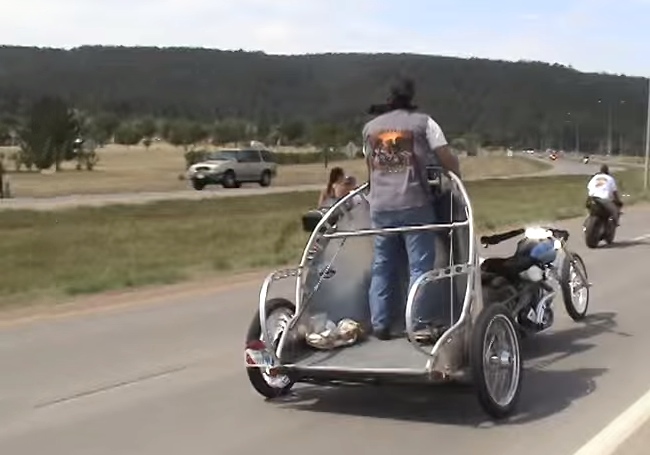 Probably The Coolest And Most Unsafe Way To Ride A Motorcycle
