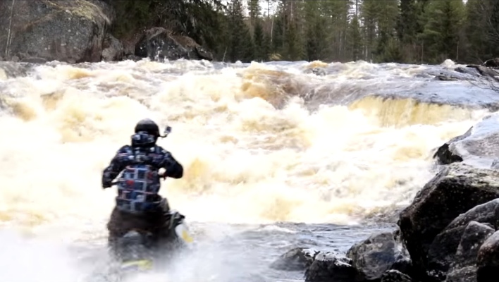 This Insane Man Rides A Snowmobile Up A Waterfall!