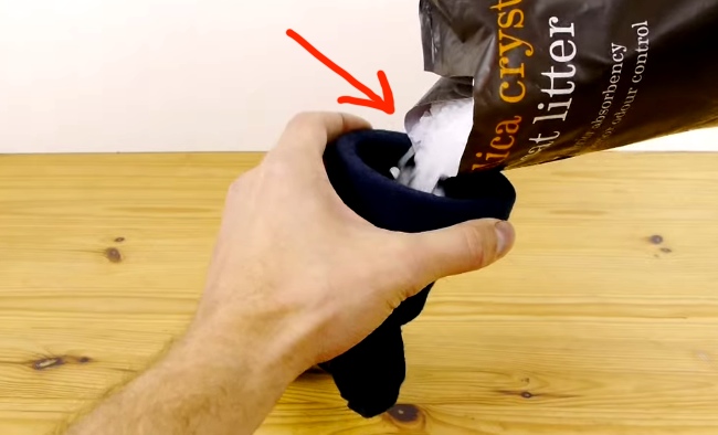 He Fills This Sock With Cat Litter. The Reason Why Is Pure Genius.