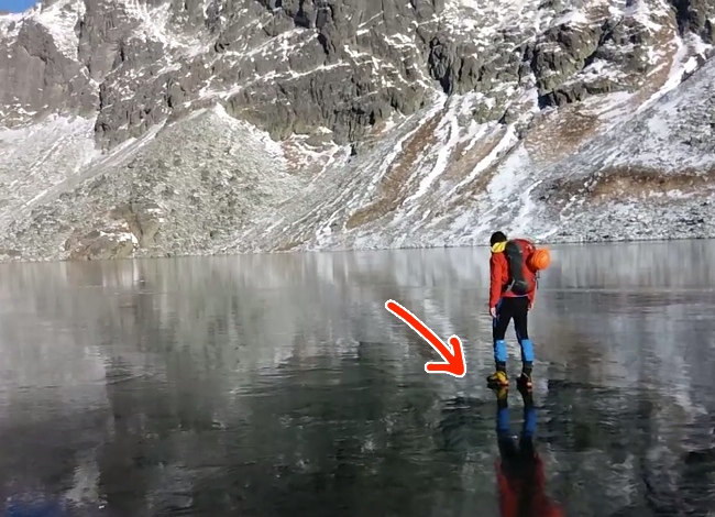 Guy Walks On A Frozen Lake, Is Blown Away By What's Under His Feet