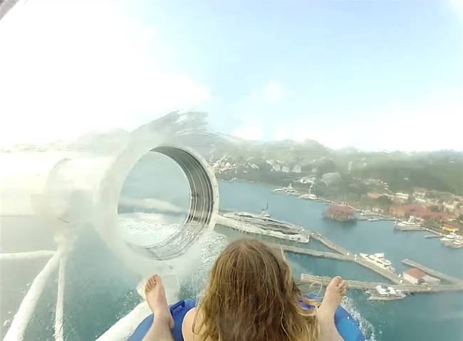 Transparent Water Coaster Extends Over The Edge Of A Cruise Ship