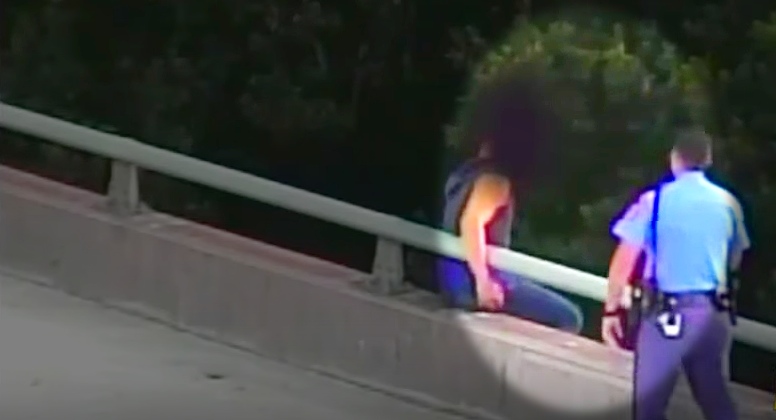 Cop Stops A Man From Jumping Off A Bridge And Gives Him A Hug
