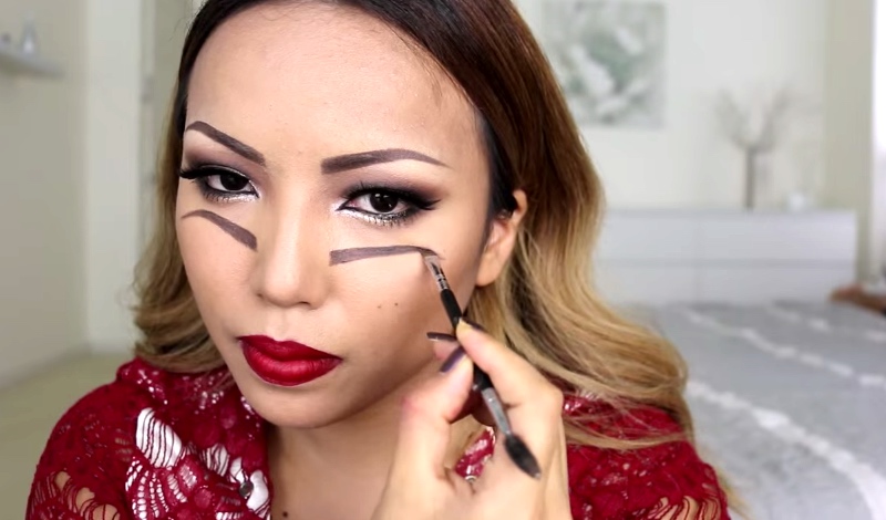 This Girl's Makeup Tutorial Will Have You Seeing Double. Literally.