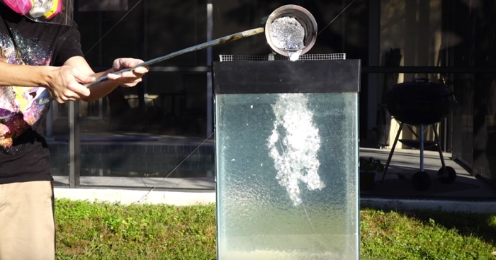 When He Pours Molten Aluminium Into A Tank Of Water Balls, The Coolest Thing Happens…