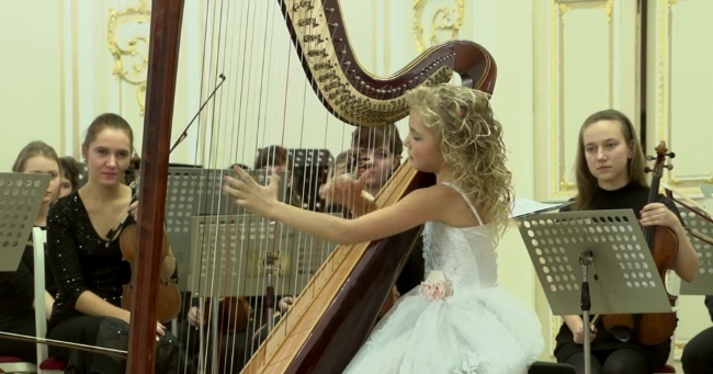 9-Year-Old Russian Girl Plays The Harp Like A Master