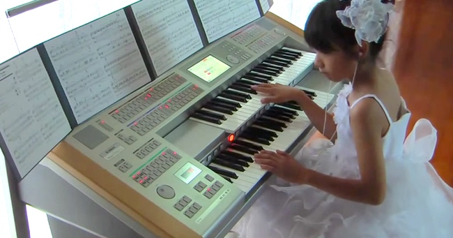 Little Girl Plays Nearly Every Star Wars Song, As The ENTIRE Orchestra