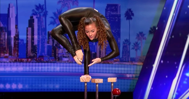 Teen Contortionist Shoots a Bow Using Just Her Feet