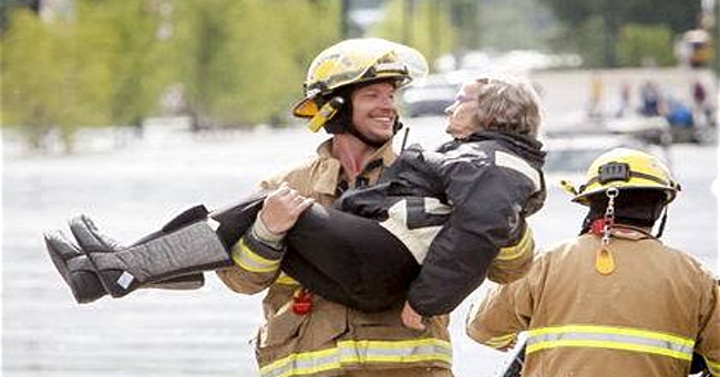Firefighter and Woman Share a Laugh After Brave Rescue