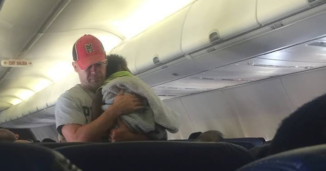Father Helps Stranger Comfort Distressed Baby on a Plane