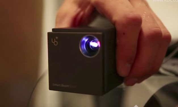 UO Smart Beam Laser: Cube-Sized Portable Mini Projector That Works on All Surfaces