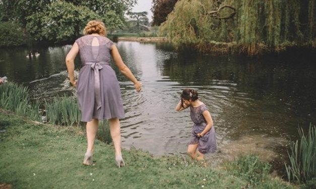 Bridesmaid Spots Gosling Snatched by Swan, Jumps in Lake with Dress On
