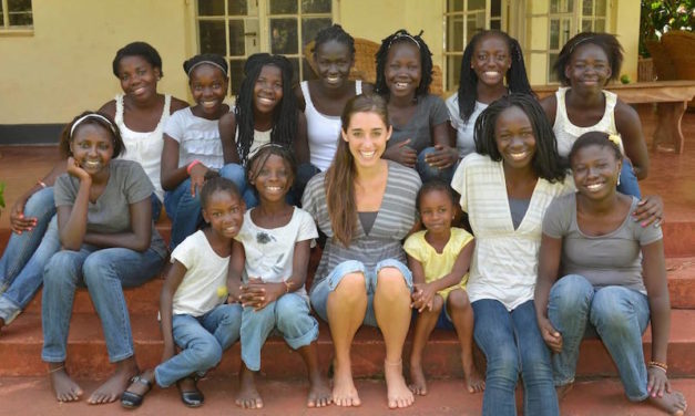 Mom Poses with 13 Daughters at Wedding, Reveals the Beautiful Reason Why She Adopted Them